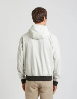 Giubbotto bomber in tessuto tecnico con cappuccio