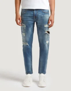 Jeans skinny fit con strappi