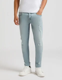 Jeans skinny fit con strappi