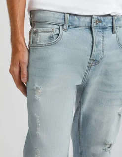 Jeans skinny fit con strappi