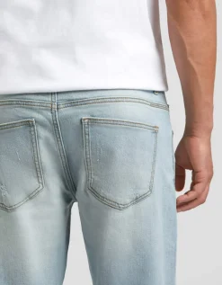 Jeans skinny fit con strappi