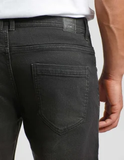 Jeans skinny fit nero con strappi