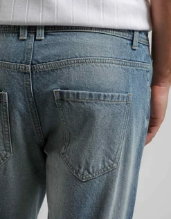 Jeans slim fit con strappi