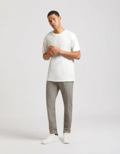 Pantaloni chino con fantasia a quadri
