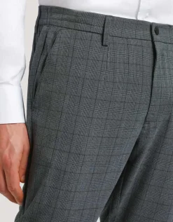 Pantaloni chino con fantasia a quadri