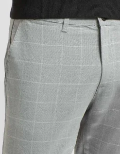 Pantaloni chino con fantasia a quadri