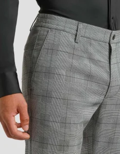 Pantaloni chino con fantasia a quadri