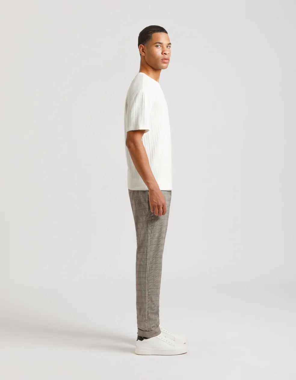 Pantaloni chino con fantasia a quadri