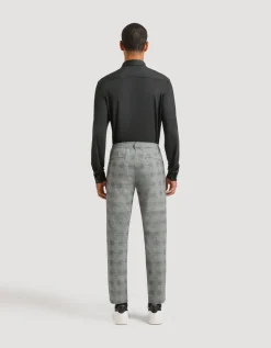 Pantaloni chino con fantasia a quadri
