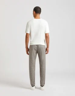 Pantaloni chino con fantasia a quadri