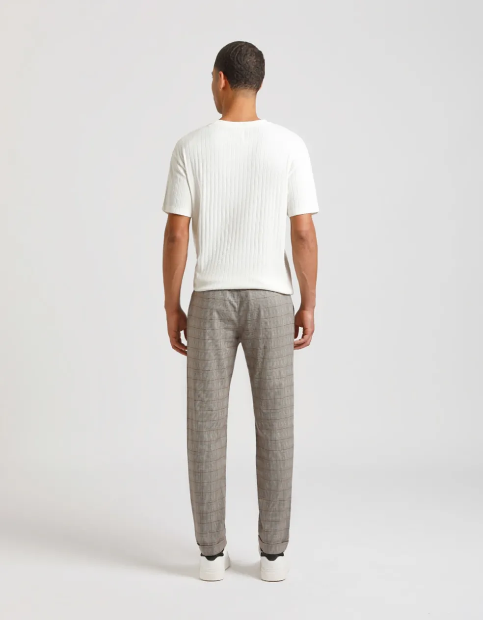 Pantaloni chino con fantasia a quadri