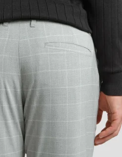 Pantaloni chino con fantasia a quadri
