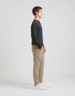 Pantaloni cinque tasche in cotone con strappi