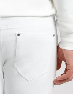 Pantaloni cinque tasche in cotone con strappi