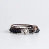 Set di bracciali in pietra e pelle
