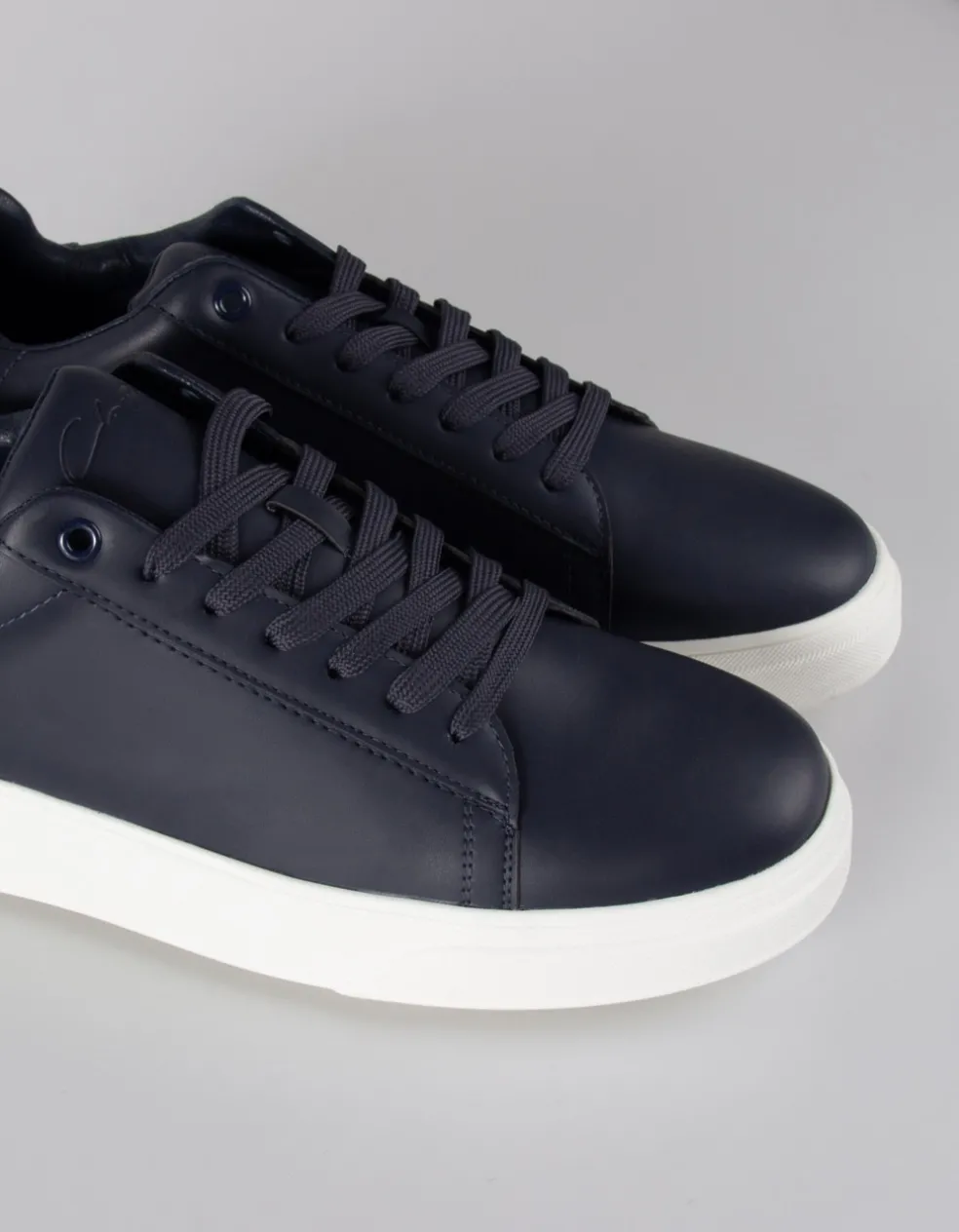 Sneakers effetto pelle