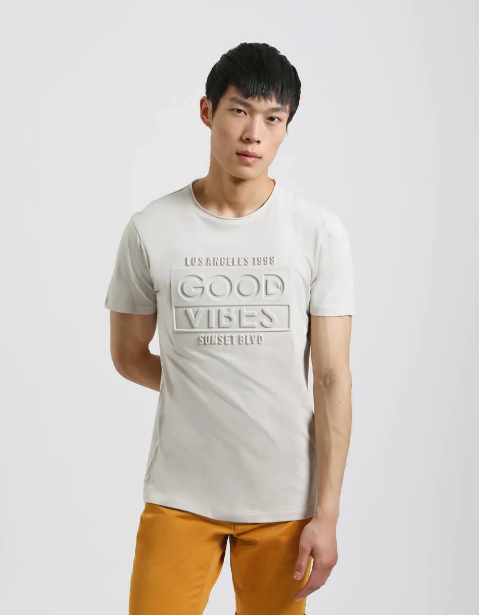 T-shirt con stampa a rilievo