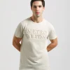 T-shirt con stampa a rilievo