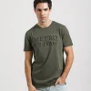 T-shirt con stampa a rilievo