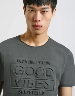 T-shirt con stampa a rilievo