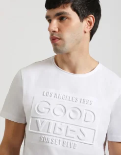 T-shirt con stampa a rilievo