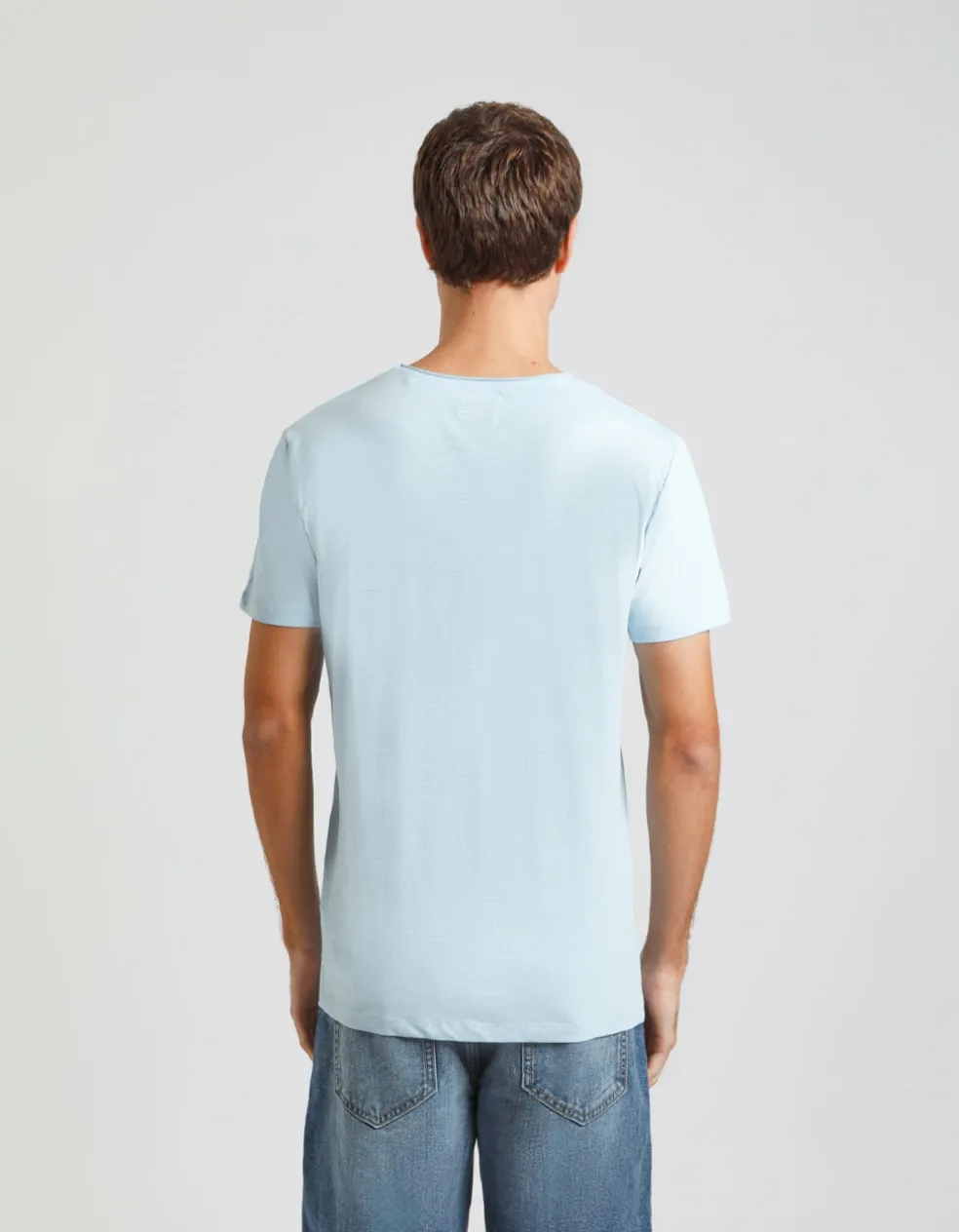 T-shirt con taschino