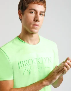 T-shirt fluo con stampa a rilievo