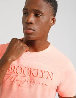 T-shirt fluo con stampa a rilievo
