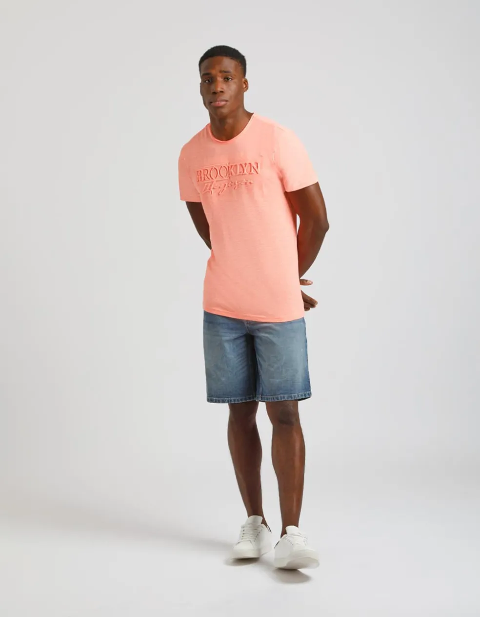 T-shirt fluo con stampa a rilievo